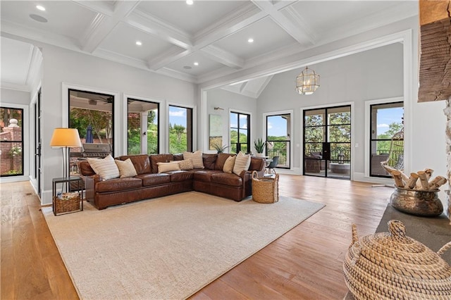 6515 Ashbourne Ct, Suwanee, GA 30024 - living room with beamed ceiling, light wood-style floors, recessed lighting, coffered ceiling, and a high ceiling