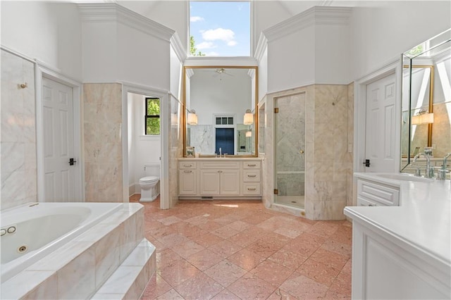 6515 Ashbourne Ct, Suwanee, GA 30024 - bathroom with a towering ceiling, a jetted tub, a shower stall, toilet, and vanity