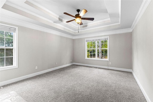 2443 High Meadows Ct, Conyers, GA 30094 - carpeted empty room featuring crown molding, baseboards, a ceiling fan, and a raised ceiling