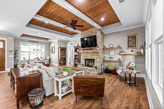 131 Quiet Cove Way, Monticello, GA 31064 - living room featuring wood ceiling, ceiling fan, baseboards, a fireplace, and wood finished floors