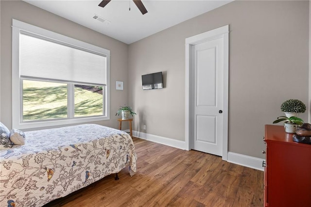 131 Quiet Cove Way, Monticello, GA 31064 - bedroom featuring wood finished floors, baseboards, and a ceiling fan