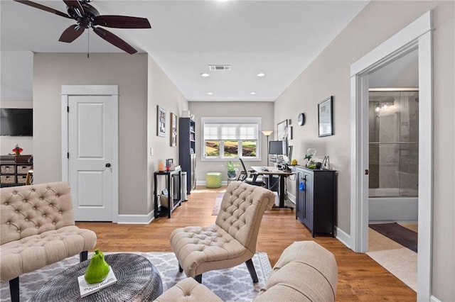 131 Quiet Cove Way, Monticello, GA 31064 - living area with light wood-type flooring, ceiling fan, baseboards, and recessed lighting
