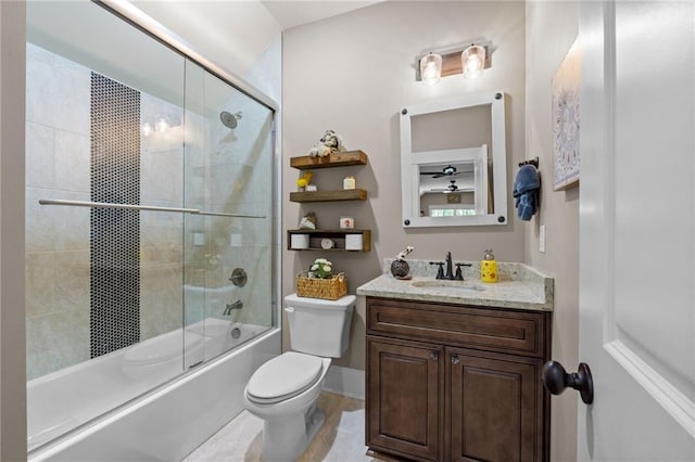131 Quiet Cove Way, Monticello, GA 31064 - bathroom featuring toilet, vanity, and bath / shower combo with glass door