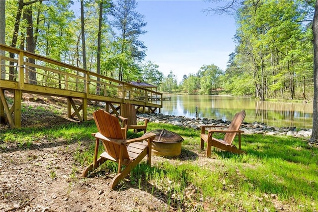131 Quiet Cove Way, Monticello, GA 31064 - view of community with a fire pit and a water view