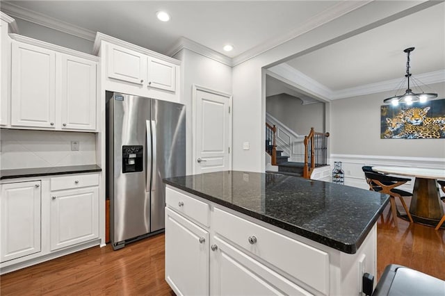 2873 Overlook Way NE, Atlanta, GA 30324 - kitchen featuring stainless steel fridge with ice dispenser, crown molding, dark wood-style flooring, white cabinetry, and recessed lighting