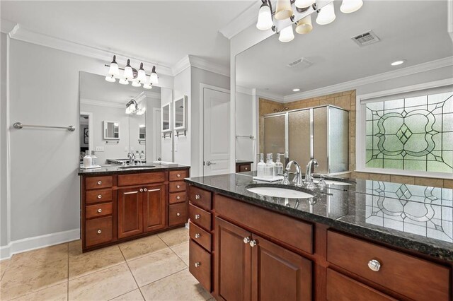 2873 Overlook Way NE, Atlanta, GA 30324 - bathroom with a chandelier, vanity, a shower stall, crown molding, and tile patterned floors