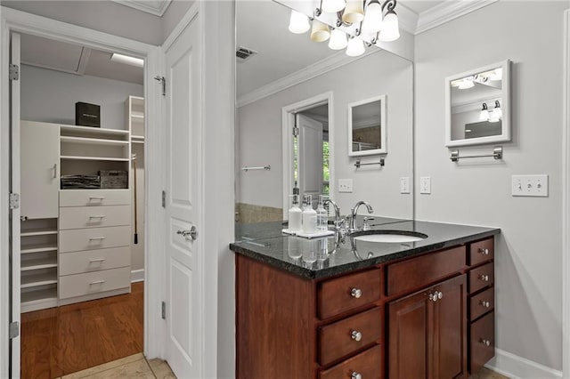 2873 Overlook Way NE, Atlanta, GA 30324 - full bathroom with crown molding, vanity, and a chandelier