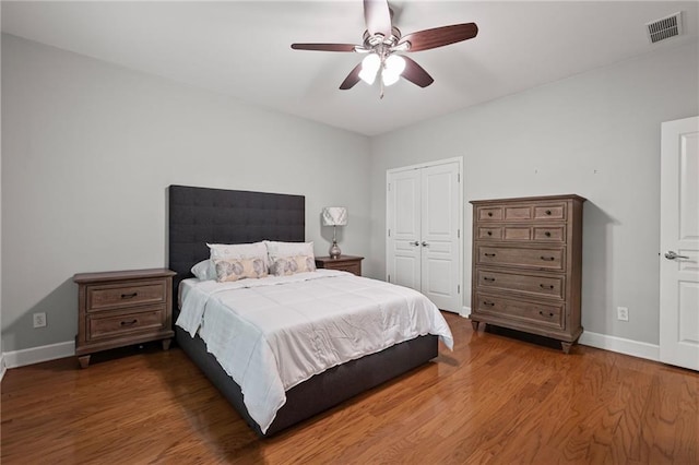 2873 Overlook Way NE, Atlanta, GA 30324 - bedroom with a closet, wood finished floors, and ceiling fan