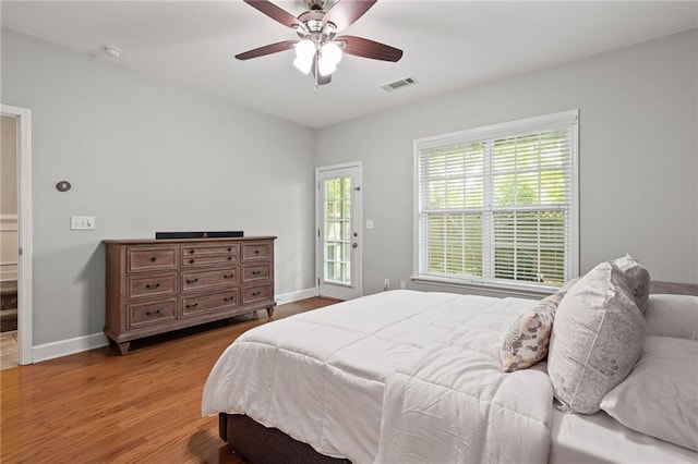 2873 Overlook Way NE, Atlanta, GA 30324 - bedroom with light wood-style floors and a ceiling fan
