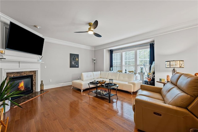 2873 Overlook Way NE, Atlanta, GA 30324 - living room with crown molding, a ceiling fan, wood finished floors, and a fireplace
