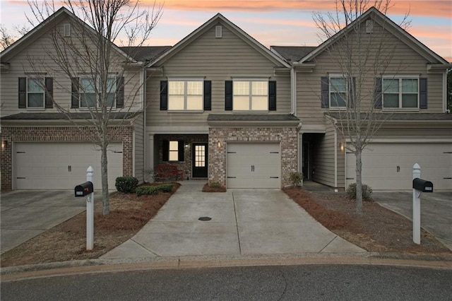 2785 Maple Park Pl, Cumming, GA 30041 - multi unit property featuring concrete driveway, brick siding, and an attached garage