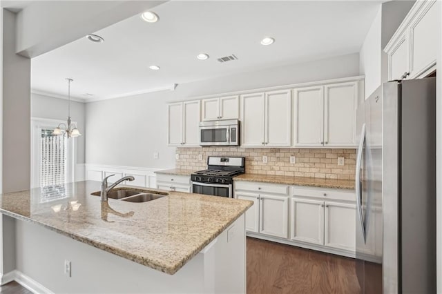2785 Maple Park Pl, Cumming, GA 30041 - kitchen featuring visible vents, appliances with stainless steel finishes, white cabinets, and a sink