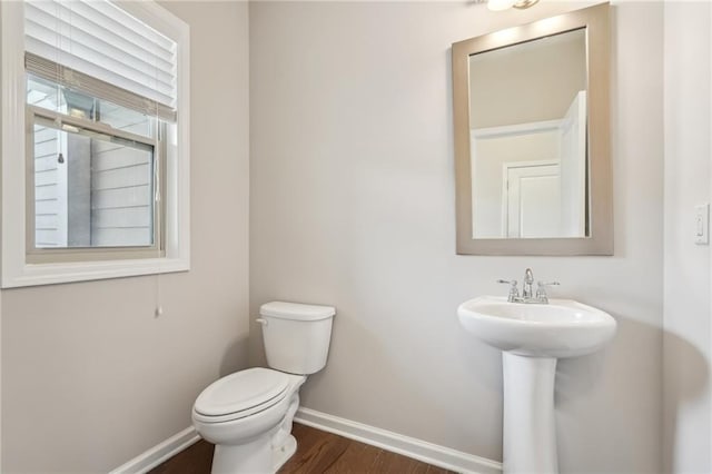 2785 Maple Park Pl, Cumming, GA 30041 - half bath with toilet, baseboards, and wood finished floors