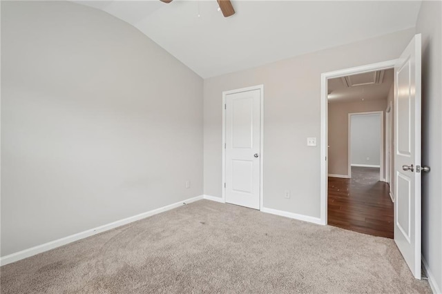 2785 Maple Park Pl, Cumming, GA 30041 - unfurnished bedroom with carpet floors, a ceiling fan, baseboards, vaulted ceiling, and attic access