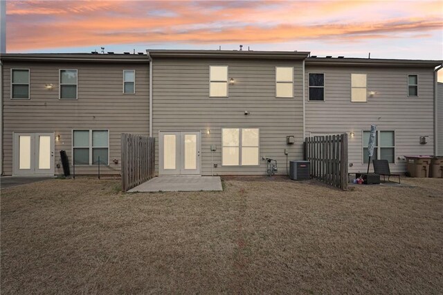 2785 Maple Park Pl, Cumming, GA 30041 - back of property with a patio area, central AC unit, a lawn, and french doors