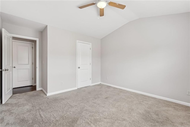 2785 Maple Park Pl, Cumming, GA 30041 - unfurnished bedroom featuring vaulted ceiling, carpet floors, a ceiling fan, and baseboards
