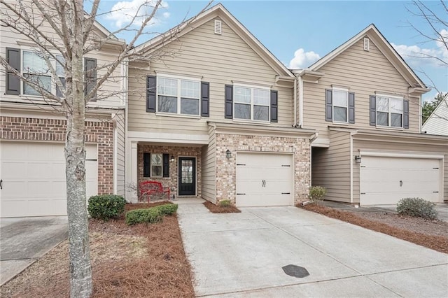 2785 Maple Park Pl, Cumming, GA 30041 - townhome / multi-family property with concrete driveway and brick siding
