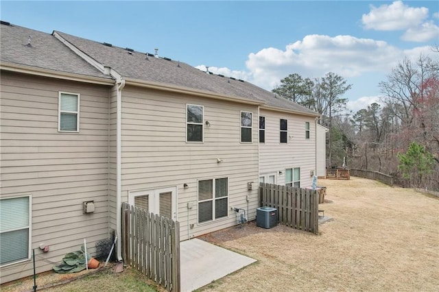 2785 Maple Park Pl, Cumming, GA 30041 - rear view of property featuring roof with shingles, a yard, a patio, central AC, and fence