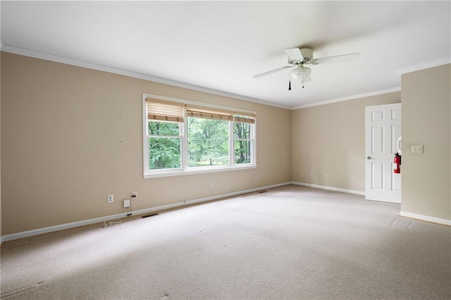 170 Mayfield Cir, Alpharetta, GA 30009 - spare room featuring baseboards, ornamental molding, ceiling fan, and carpet