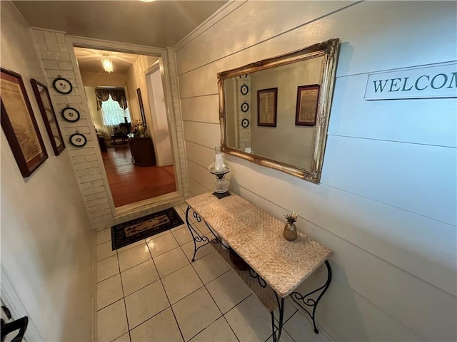 hallway with light tile patterned floors