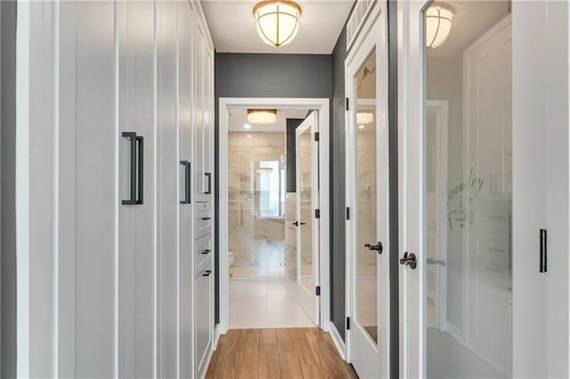 hallway featuring light hardwood / wood-style flooring