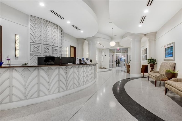 reception area with ornate columns