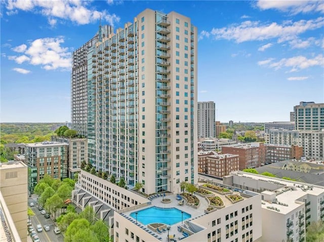 view of property featuring a community pool