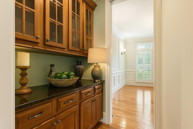 1565 Briergate Dr, Duluth, GA 30097 - bar with light wood-style flooring and crown molding