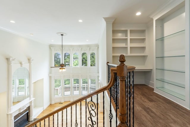 1565 Briergate Dr, Duluth, GA 30097 - corridor featuring wood finished floors, recessed lighting, crown molding, and built in features