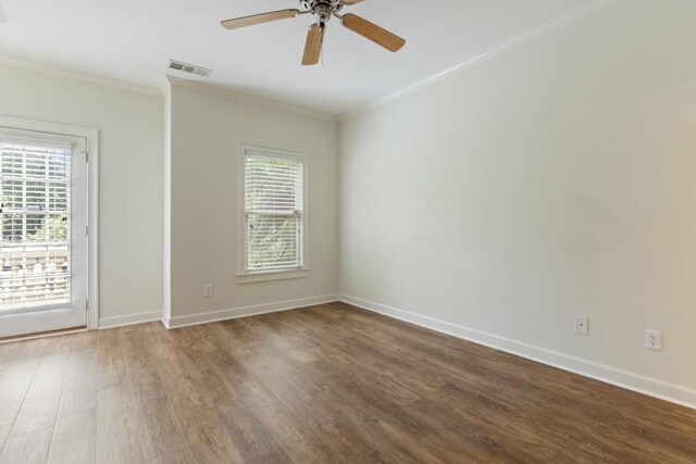 1565 Briergate Dr, Duluth, GA 30097 - empty room with wood finished floors, crown molding, and a ceiling fan
