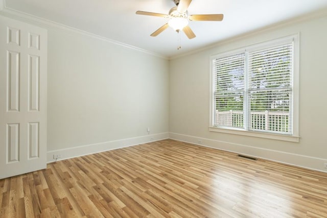 1565 Briergate Dr, Duluth, GA 30097 - spare room with light wood-style flooring, crown molding, and a ceiling fan