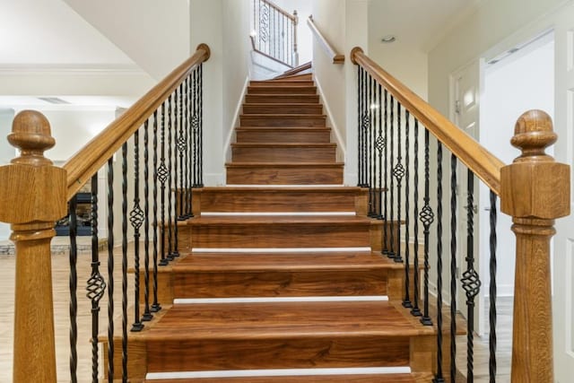 1565 Briergate Dr, Duluth, GA 30097 - stairway featuring ornamental molding, wood finished floors, and recessed lighting