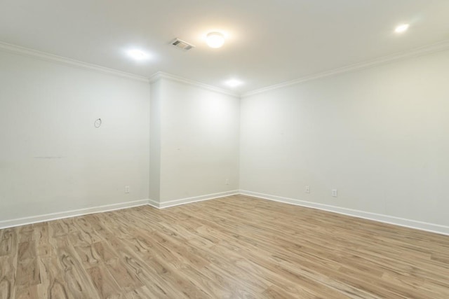 1565 Briergate Dr, Duluth, GA 30097 - unfurnished room with ornamental molding, light wood-type flooring, and recessed lighting