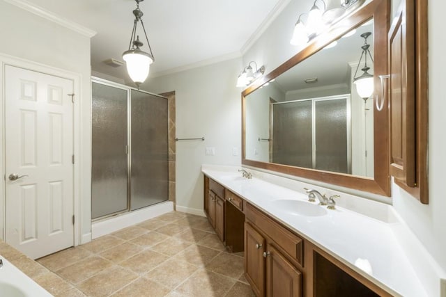 1565 Briergate Dr, Duluth, GA 30097 - full bathroom featuring double vanity, a shower stall, crown molding, and tile patterned flooring