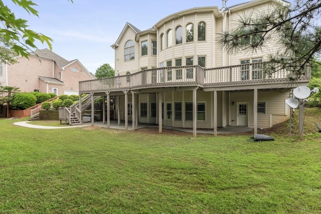 1565 Briergate Dr, Duluth, GA 30097 - rear view of property with a deck, stairs, and a lawn