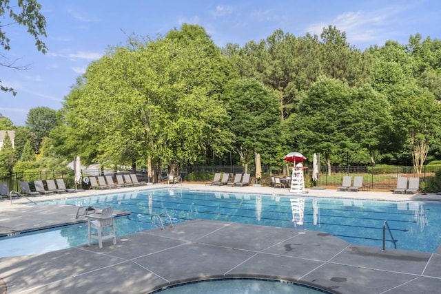 1565 Briergate Dr, Duluth, GA 30097 - community pool featuring a patio area