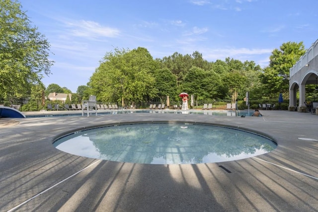 1565 Briergate Dr, Duluth, GA 30097 - community pool featuring a patio area