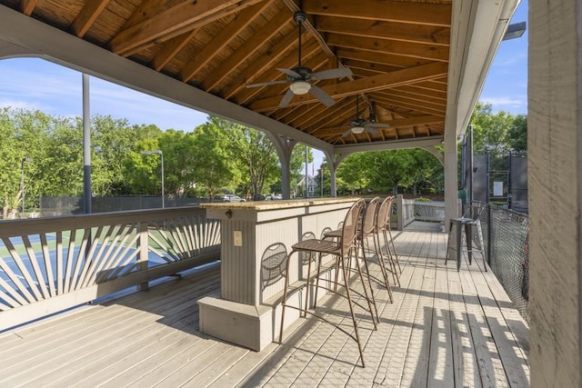 1565 Briergate Dr, Duluth, GA 30097 - deck featuring a ceiling fan and view of scattered trees