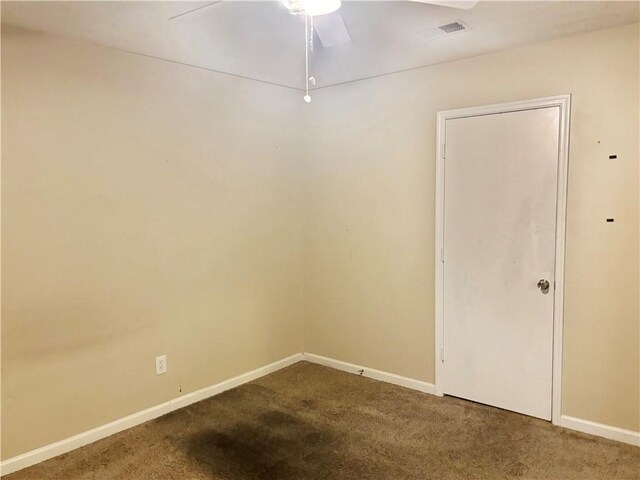 unfurnished room featuring carpet floors and ceiling fan