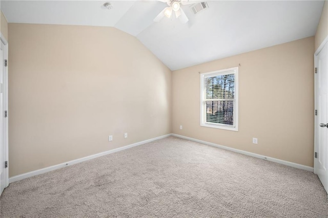 unfurnished bedroom with ceiling fan, carpet floors, and lofted ceiling