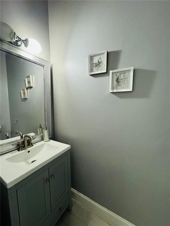 bathroom featuring tile patterned floors and vanity