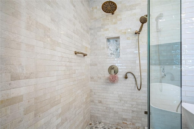 bathroom with a shower stall