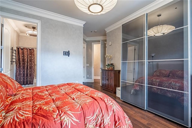 bedroom featuring crown molding and dark wood-style flooring