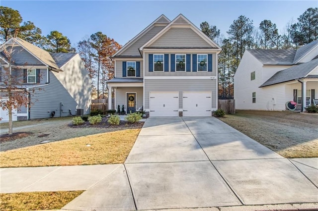 view of front facade featuring a garage and a front yard