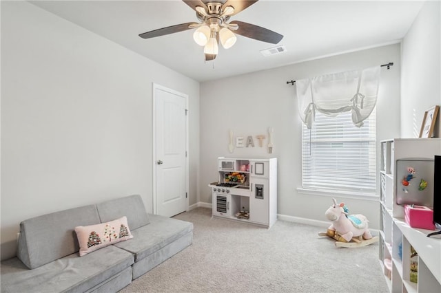 127 Ridgewood Way, Dallas, GA 30132 - playroom featuring light colored carpet, ceiling fan, and baseboards