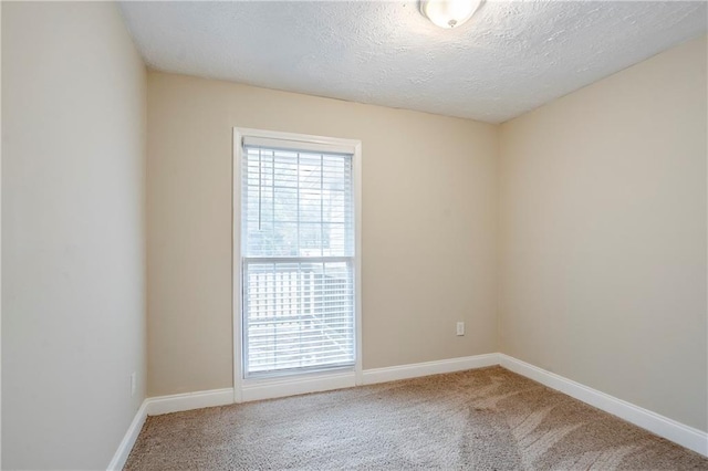 3743 Turner Heights Dr, Decatur, GA 30032 - empty room featuring carpet floors and a textured ceiling