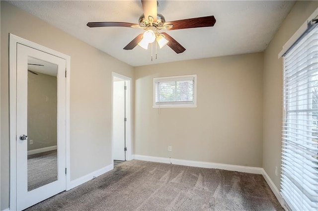 3743 Turner Heights Dr, Decatur, GA 30032 - unfurnished bedroom featuring light colored carpet and ceiling fan