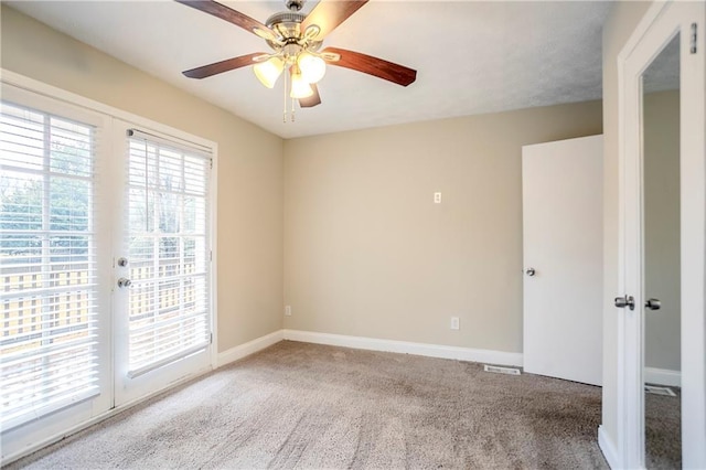 3743 Turner Heights Dr, Decatur, GA 30032 - spare room featuring french doors, light colored carpet, and ceiling fan