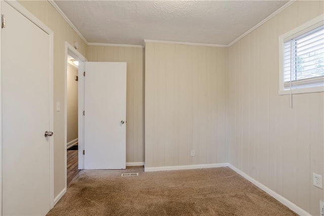 3743 Turner Heights Dr, Decatur, GA 30032 - spare room with crown molding, carpet flooring, and a textured ceiling