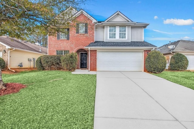 front of property featuring a front yard and a garage